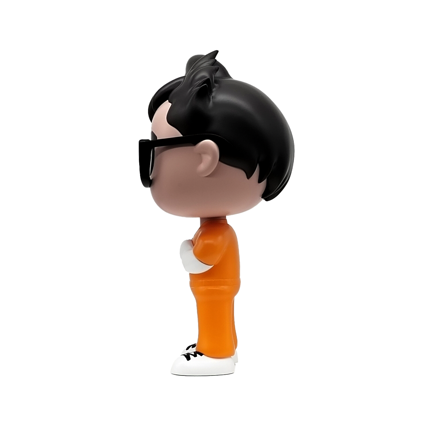 Ian Bick host of Locked In figurine of a character with black hair and sunglasses, wearing an orange outfit on a white background