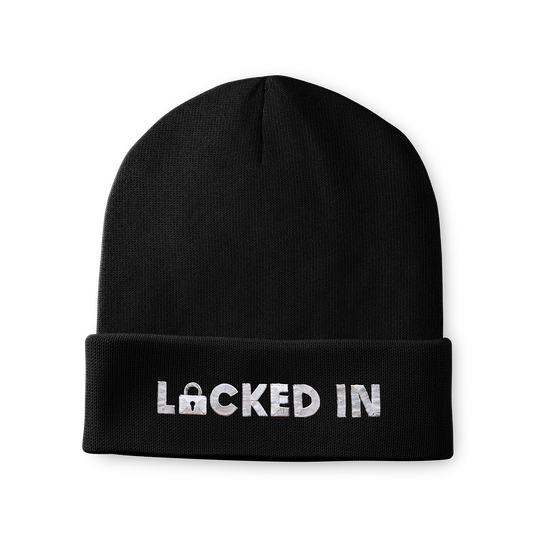 Front view of black cuffed beanie with fold, flat-embroidered “LOCKED IN” logo and small lock icon on the cuff.